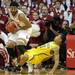 Michigan sophomore Trey Burke is fouled by Indiana senior Christian Watford during the first half at Assembly Hall on Saturday, Feb. 2 in Bloomington, Ind. Melanie Maxwell I AnnArbor.com